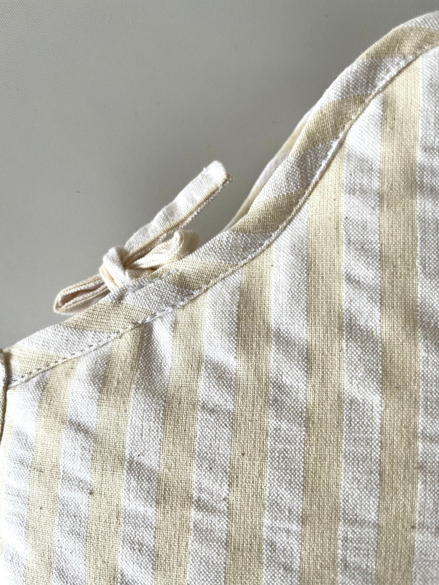 FUNDA GUATERO RAYAS BEIGE