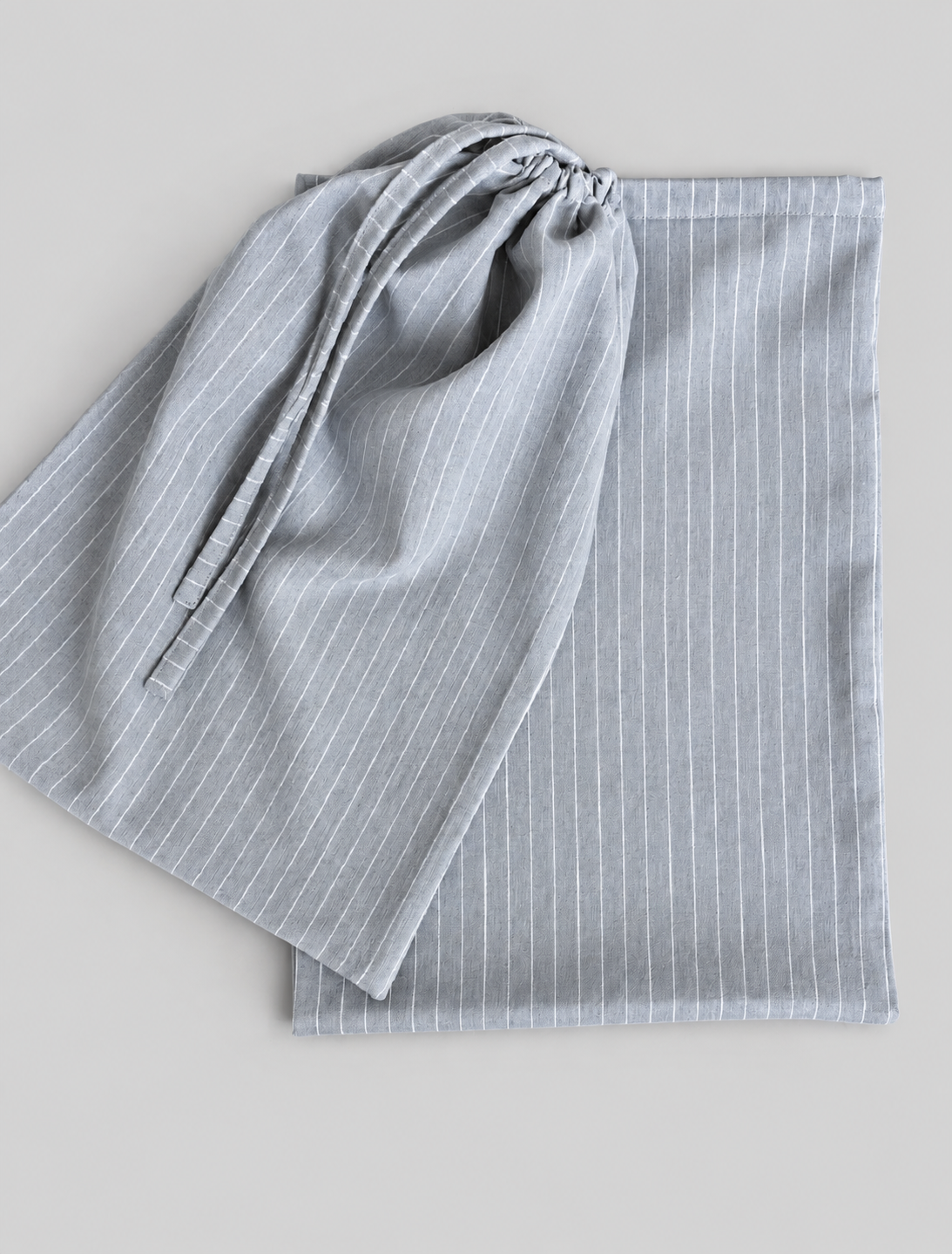 PAR BOLSAS GÉNERO RAYITAS GRIS