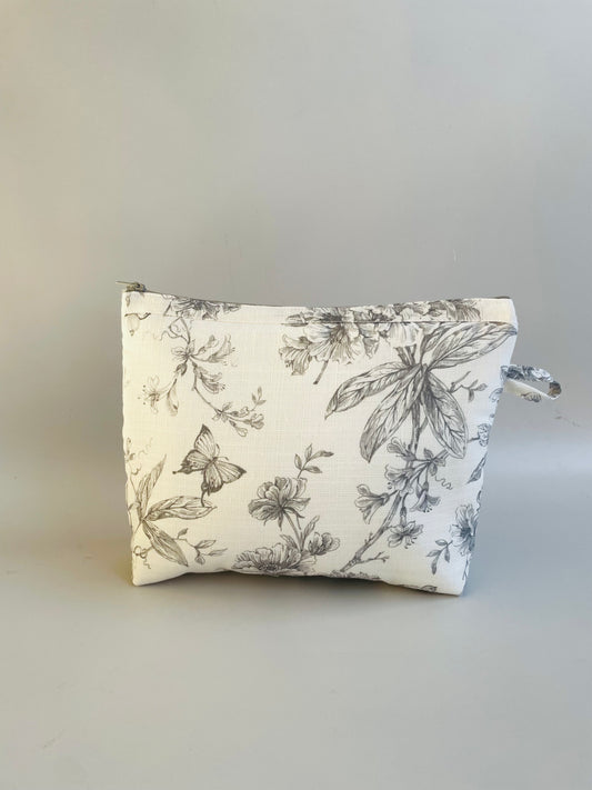 ESTUCHE-COSMETIQUERO FLOR GRIS