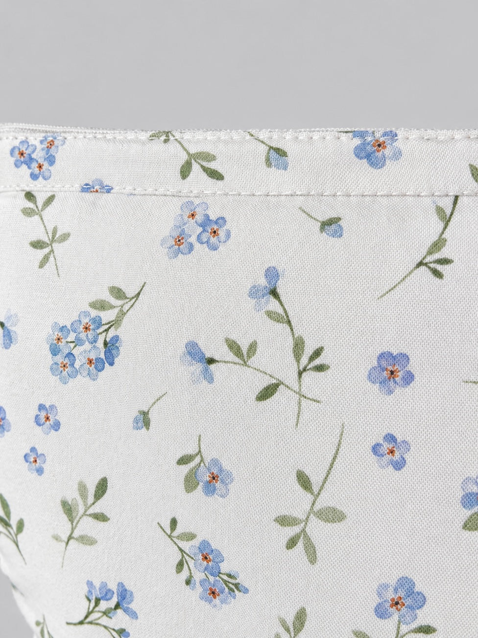 ESTUCHE-COSMETIQUERO FLOR CELESTE