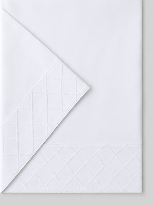 JUEGO DE SÁBANAS ROMBOS BLANCOS