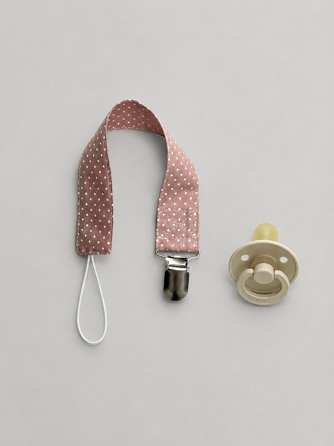 PORTA CHUPETES ROSADO