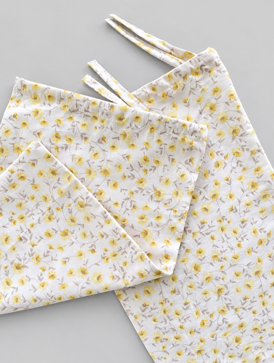 PAR BOLSAS GÉNERO FLOR AMARILLA